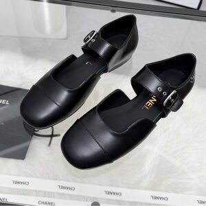 Women's CHANEL Black Loafers with Silver Accents